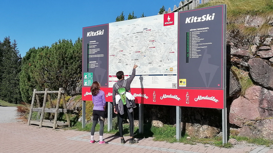 Panorama information system with Almdudler advertising board in the Kitzbühel ski area