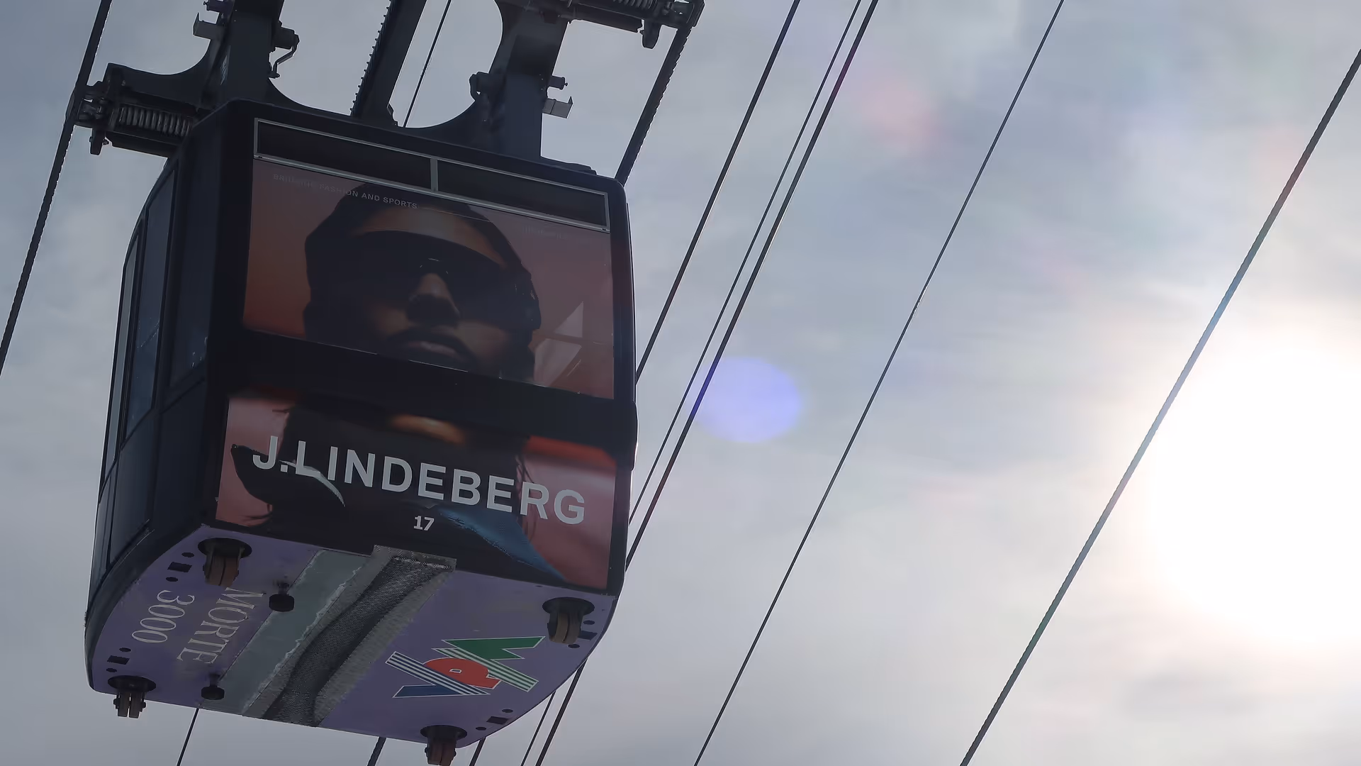 Eye-catching branding of a gondola with the Lindeberg brand in Switzerland