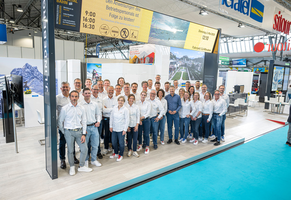 Group photo of the sitour feratel team at the stand at Interlapin 2025