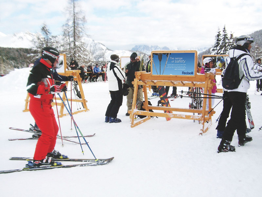 Ski stand advertising with Redaelli motif in the Italian Alps
